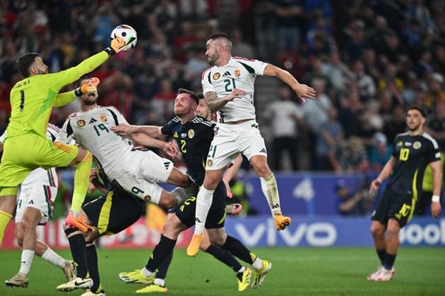 STUTTGART, GERMANY - JUNE 23: Barnabas Varga of Hungary goes down with a serious head injury during the UEFA EURO, EM, Europameisterschaft,Fussball 2024 group stage match between Scotland and Hungary at Stuttgart Arena on June 23, 2024 in Stuttgart, G Scotland v Hungary: Group A - UEFA EURO 2024 Copyright: xSebastianxFrejx