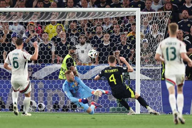 Peter Gulacsi (Hungary)Scott McTominay (Scotland) during the UEFA EURO, EM, Europameisterschaft,Fussball Germany 2024 match between Scotland 0-1 Hungary at Stuttgart Arena on June 23, 2024 in Stuttgart, Germany. Noxthirdxpartyxsales  (257444987)