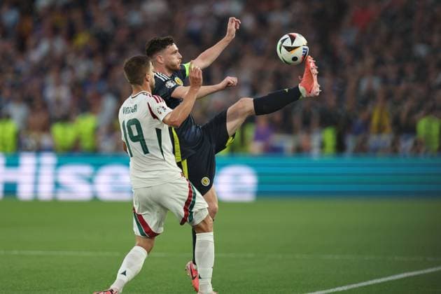 Andrew Robertson (Scotland)Barnabas Varga (Hungary) during the UEFA EURO, EM, Europameisterschaft,Fussball Germany 2024 match between Scotland 0-1 Hungary at Stuttgart Arena on June 23, 2024 in Stuttgart, Germany. Noxthirdxpartyxsales  (257445257)