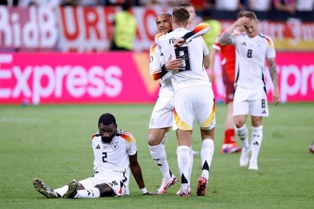FUELLKRUG Niclas Team Deutschland Jubelt nach Schlusspfiff mit SANE Leroy am Boden RUEDIGER Antonio UEFA Fussball EURO 2024 in Deutschland Vorrundenspiel Gruppe A Schweiz - Deutschland 1 : 1 am 23.06.2024 in Frankfurt DFL REGULATIONS PROHIBIT ANY USE OF PHOTOGRAPHS as IMAGE SEQUENCES and or QUASI-VIDEO Copyright: xLacixPerenyix