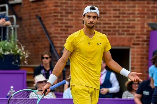 (240624) -- LONDON, June 24, 2024 -- Lorenzo Musetti of Italy reacts during the men s singles final match between Tommy Paul of the United States and Lorenzo Musetti of Italy at the Cinch ATP, Tennis Herren Championships at The Queen s Club in London, Britain, June 23, 2024. (Photo by Xinhua) (SP)BRITAIN-LONDON-TENNIS-QUEEN S CLUB-MEN S SINGLES-FINAL StephenxChung 