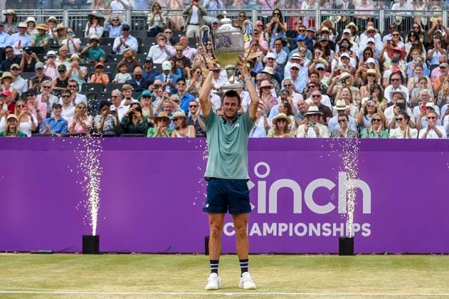 (240624) -- LONDON, June 24, 2024 -- Tommy Paul of the United States celebrates with the trophy at the awarding ceremony after the men s singles final match between Tommy Paul of the United States and Lorenzo Musetti of Italy at the Cinch ATP, Tennis Herren Championships at The Queen s Club in London, Britain, June 23, 2024. (Photo by Xinhua) (SP)BRITAIN-LONDON-TENNIS-QUEEN S CLUB-MEN S SINGLES-FINAL StephenxChung 