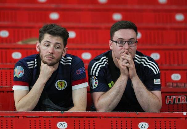 Football - 2024 UEFA European Championship, EM, Europameisterschaft Finals - Group A - Scotland vs Hungary - Stuggart Arena - Sunday 23rd June 2024 Scotland fans are dejected at full time as Scotland are knocked out of Euro 2024 after losing to Hungary 1-0 