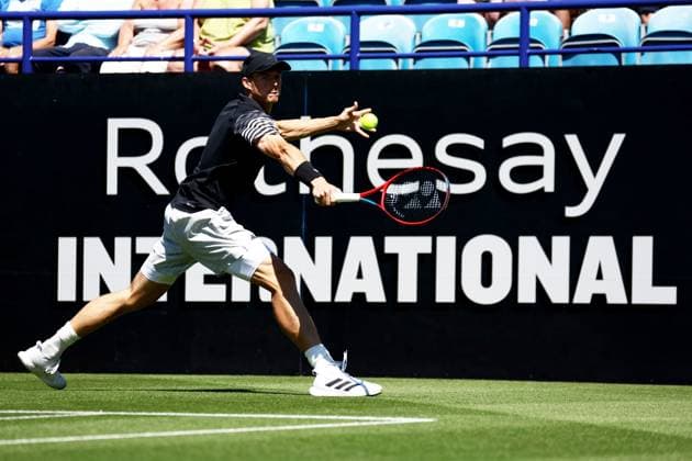 Billy Harris of Great Britain in action during their match. Rothesay International Eastbourne, Day 2, Tennis, Devonshire Park, Eastbourne, UK - 24 June 2024  Copyright: xJamesxMarsh Shutterstockx 14551026p