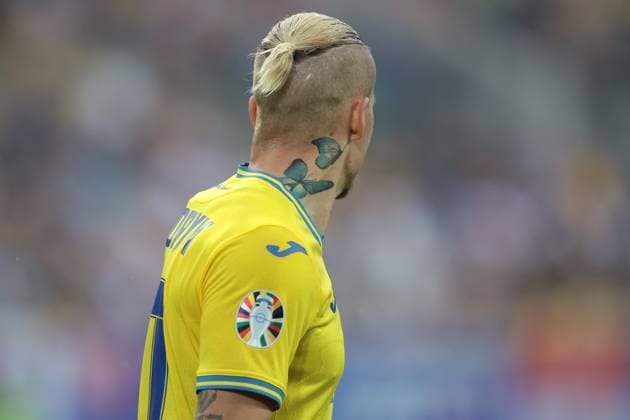 Dusseldorf, Germany, 21st June 2024. Tattoos of butterflies are seen on the nehk of Mykhailo Mudryk of Ukraine during the UEFA European Championships match at Dusseldorf Arena, Dusseldorf. Picture credit should read: Jonathan Moscrop Sportimage EDITORIAL USE ONLY. No use with unauthorised audio, video, data, fixture lists, club league logos or live services. Online in-match use limited to 120 images, no video emulation. No use in betting, games or single club league player publications. SPI-3188-0129