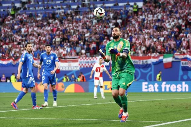 Gianluigi Donnarumma of Italy catches the ball Croatia v Italy, UEFA European Championship, EM, Europameisterschaft 2024, Group B, Football, Leipzig Stadium, Leipzig, Germany, 24 Jun 2024 EDITORIAL USE ONLY No use with unauthorised audio, video, data, fixture lists, club league logos or live services. Online in-match use limited to 120 images, no video emulation. No use in betting, games or single club league player publications. Copyright: xMattxWest Shutterstockx 14551036at