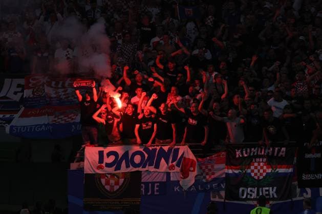 Leipzig, Germany 24.06.2024: Croatian fans smoke bombs during the UEFA EURO, EM, Europameisterschaft,Fussball 2024 Matchday 3, group stage B football match between Croatia vs Italy at Leipzig Stadium.  Copyright: xx xx IPA_Agency_IPA47446978