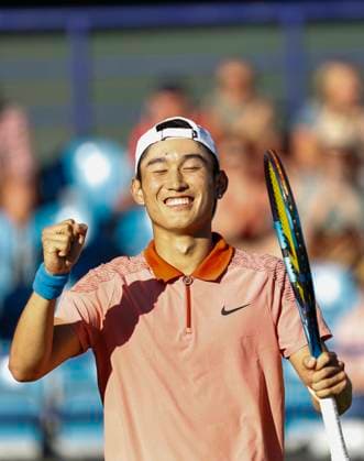 24th June 2024; Devonshire Park, Eastbourne, East Sussex, England: Rothesay International Eastbourne, Day 1; Juncheng Shang (CHN) celebrates his victory after defeating Tomas Martin Etchverry (ARG)  ActionPlus12660067 HongboxChen