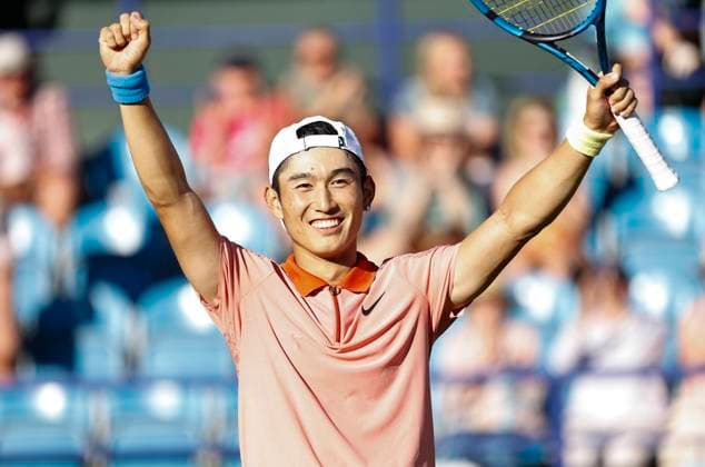 24th June 2024; Devonshire Park, Eastbourne, East Sussex, England: Rothesay International Eastbourne, Day 1; Juncheng Shang (CHN) celebrates his victory after defeating Tomas Martin Etchverry (ARG)  ActionPlus12660068 HongboxChen