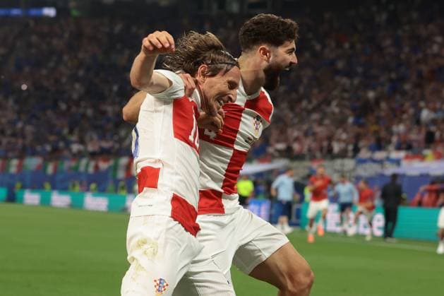 Sport Themen der Woche KW26 Sport Bilder des Tages Leipzig, Germany, 24th June 2024. Luka Modric of Croatia celebrates with team mates after scoring to give the side a 1-0 lead during the UEFA European Championships match at Leipzig Stadium, Leipzig. Picture credit should read: Jonathan Moscrop Sportimage EDITORIAL USE ONLY. No use with unauthorised audio, video, data, fixture lists, club league logos or live services. Online in-match use limited to 120 images, no video emulation. No use in betting, games or single club league player publications. SPI-3190-0013