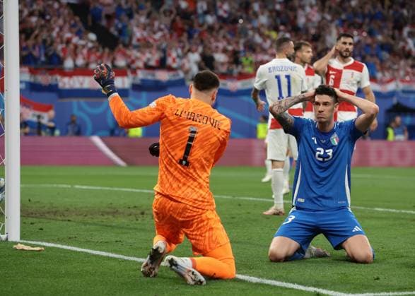 Leipzig, Germany, 24th June 2024. Alessandro Bastoni of Italy reacts after Dominik Livakovic of Croatia saved a point blank header from the Italian defender during the UEFA European Championships match at Leipzig Stadium, Leipzig. Picture credit should read: Jonathan Moscrop Sportimage EDITORIAL USE ONLY. No use with unauthorised audio, video, data, fixture lists, club league logos or live services. Online in-match use limited to 120 images, no video emulation. No use in betting, games or single club league player publications. SPI-3190-0014