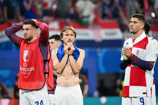 Leipzig, Germany, 240624. Leipzig Stadium. UEFA EURO, EM, Europameisterschaft,Fussball 2024. Croatian Marco Pasalic, Luka Modric and Andrej Kramaric after losing the match Croatia - Italy, 3rd round of the European Championship, EM, Europameisterschaft Group B. Photo: Ante Cizmic CROPIX Leipzig Germany Copyright: xxAntexCizmicx xCROPIXx hrvatska_italija312-240624