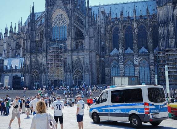 Police presence in Cathedral square England v Slovenia, UEFA European Championship, EM, Europameisterschaft 2024, Group C, Football, Cologne Stadium, Cologne, Germany, 25 Jun 2024 EDITORIAL USE ONLY No use with unauthorised audio, video, data, fixture lists, club league logos or live services. Online in-match use limited to 120 images, no video emulation. No use in betting, games or single club league player publications.  Copyright: xDavexShopland Shutterstockx 14555527h