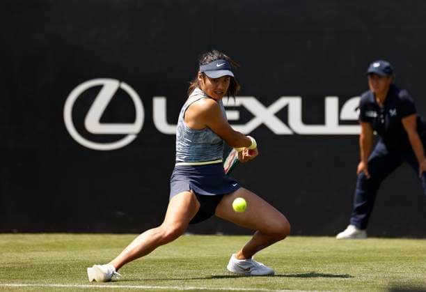 25th June 2024; Devonshire Park, Eastbourne, East Sussex, England: Rothesay International Eastbourne, Day 2, Emma Raducanu (GBR) plays a backhand against Sloane Stephens (USA) womens singles  ActionPlus12660405 HongboxChen