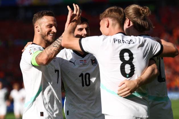 Sport Bilder des Tages SOCCER - UEFA EURO, EM, Europameisterschaft,Fussball 2024 BERLIN,GERMANY,25.JUN.24 - UEFA EURO 2024, group stage, Austria vs Netherlands. Image shows the rejoicing of Marko Arnautovic, Florian Grillitsch, Alexander Prass and Patrick Wimmer (AUT).  GEPAxpictures xArminxRauthner