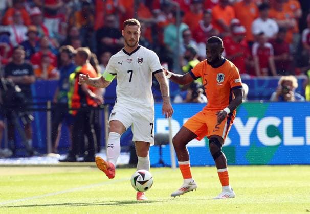 25.06.2024, xtgx, Fussball EM 2024, Niederlande - Österreich emspor, v.l. Marko Arnautovic (Oesterreich), Lutsharel Geertruida (Niederlande) (DFL DFB REGULATIONS PROHIBIT ANY USE OF PHOTOGRAPHS as IMAGE SEQUENCES and or QUASI-VIDEO) Berlin