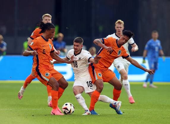 25.06.2024, xtgx, Fussball EM 2024, Niederlande - Österreich emspor, v.l. Nathan Ake (Niederlande), Romano Schmid (Oesterreich), Tijjani Reijnders (Niederlande) (UEFA REGULATIONS PROHIBIT ANY USE OF PHOTOGRAPHS as IMAGE SEQUENCES and or QUASI-VIDEO) Berlin