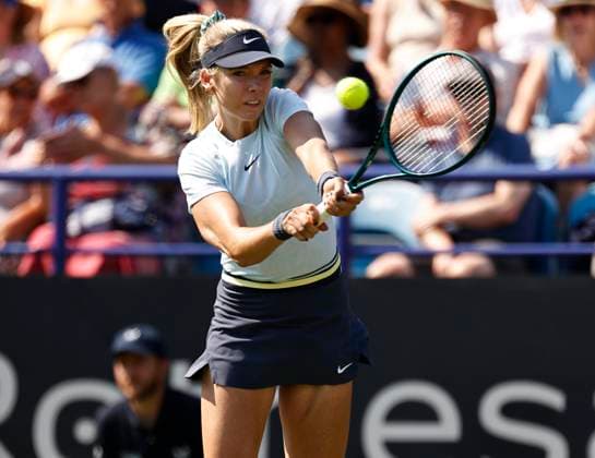 25th June 2024; Devonshire Park, Eastbourne, East Sussex, England: Rothesay International Eastbourne, Day 2, Katie Boulter (GBR) plays a backhand against Petra Martic (CRO) , womens singles  ActionPlus12660460 HongboxChen