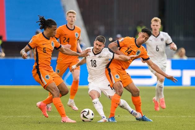SOCCER - UEFA EURO, EM, Europameisterschaft,Fussball 2024 BERLIN,GERMANY,25.JUN.24 - UEFA EURO 2024, group stage, Austria vs Netherlands. Image shows Nathan Ake (NED), Romano Schmid (AUT) and Tijjani Reijnders (NED).  GEPAxpictures xJohannesxFriedl