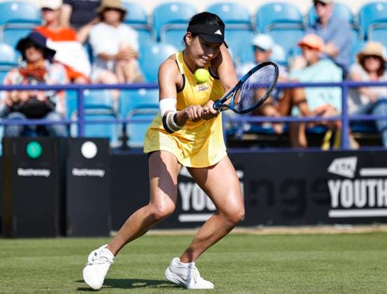 25th June 2024; Devonshire Park, Eastbourne, East Sussex, England: Rothesay International Eastbourne, Day 2, Xinyu Wang (CHN) plays a backhand aganst Daria Kasatkina , womens singles match  ActionPlus12660496 HongboxChen