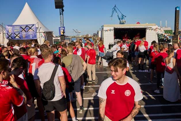 Football fans in line at food and beer stalls before the EURO match between Denmark and Serbia on the waterfront in Aarhus Tuesday, June 25, 2024.. (Photo: Mikkel Berg Pedersen Ritzau Scanpix) , Aarhus Denmark Copyright: MikkelxBergxPedersenx spdk20240625-192948-L