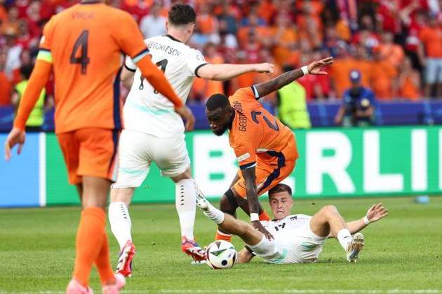 SOCCER - UEFA EURO, EM, Europameisterschaft,Fussball 2024 BERLIN,GERMANY,25.JUN.24 - UEFA EURO 2024, group stage, Austria vs Netherlands. Image shows Michael Gregoritsch (AUT), Lutsharel Geertruida (NED) and Christoph Baumgartner (AUT).  GEPAxpictures xArminxRauthner