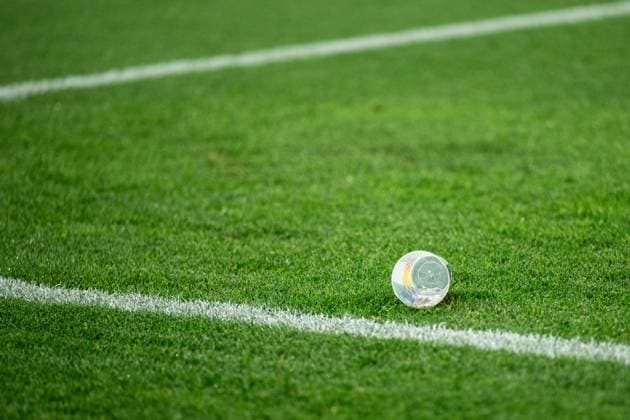 240625 A plastic cup on the pitch during the UEFA EURO, EM, Europameisterschaft,Fussball 2024 Football Championship match between Denmark and Serbia on June 25, 2024 in Munich. Photo: Mathias Bergeld BILDBYRAN kod MB MB0940 fotboll football soccer fotball fotbolls-em europamästerskap em uefa euro uefa european football championship euro 2024 danmark denmark serbien serbia bbeng Copyright: MATHIASxBERGELD BB240625MB055