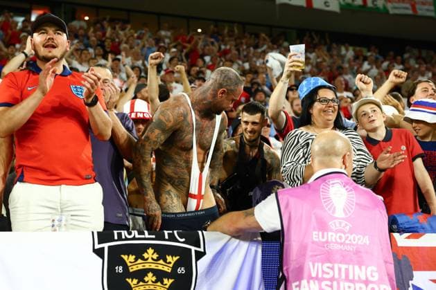 England fan wears an England coloured Mankini England v Slovenia, UEFA European Championship, EM, Europameisterschaft 2024, Group C, Football, Cologne Stadium, Cologne, Germany, 25 Jun 2024 EDITORIAL USE ONLY No use with unauthorised audio, video, data, fixture lists, club league logos or live services. Online in-match use limited to 120 images, no video emulation. No use in betting, games or single club league player publications. Copyright: xKieranxMcManus Shutterstockx 14555526dd