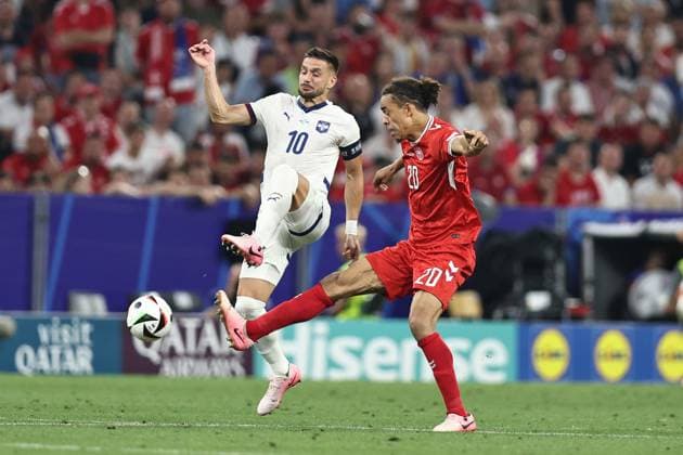 Dusan Tadic (Serbia)Yussuf Poulsen (Denmark) during the UEFA EURO, EM, Europameisterschaft,Fussball Germany 2024 match between Denmark 0-0 Serbia at Munich Football Arena on June 25, 2024 in Munich, Germany. Noxthirdxpartyxsales  (257681424)