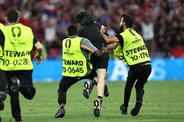 Pitch Invasion during the UEFA EURO, EM, Europameisterschaft,Fussball Germany 2024 match between Denmark 0-0 Serbia at Munich Football Arena on June 25, 2024 in Munich, Germany. Noxthirdxpartyxsales  (257681450)
