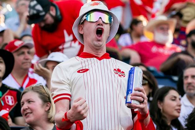 KANSAS CITY, KS - JUNE 25: A Canada fan celebrates a goal during the COPA America group A match between Canada and Peru on Tuesday June 25, 2024 at Children™s Mercy Park in Kansas City, KS. (Photo by Nick Tre. Smith Icon Sportswire) SOCCER: JUN 25 CONMEBOL Copa America - Peru vs Canada EDITORIAL USE ONLY Icon2406250133