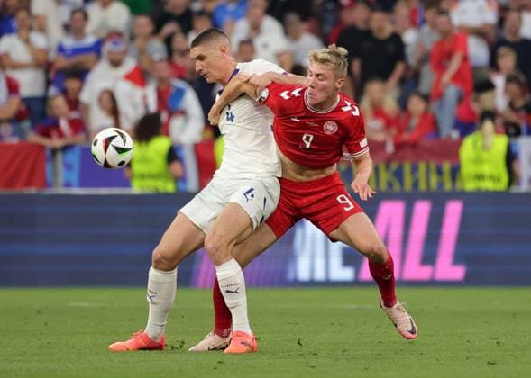 (240626) -- MUNICH, June 26, 2024 -- Rasmus Hojlund (R) of Denmark vies with Nikola Milenkovic of Serbia during the UEFA EURO, EM, Europameisterschaft,Fussball 2024 Group C match between Denmark and Serbia in Munich, Germany, June 25, 2024. (Photo by Xinhua) (SP)GERMANY-MUNICH-FOOTBALL-EURO 2024-DENMARK VS SERBIA PhilippexRuiz 