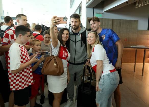 Croatia National Football Team arrive in Zagreb, Croatia Bruno Petkovic of Croatia pose for a photo with fans at Franjo Tudjman Airport in Zagreb, Croatia, on June 26, 2024. RobertxAnic PIXSELL