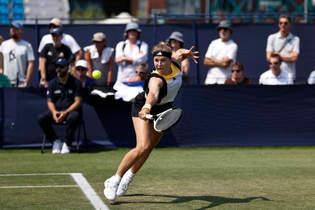 26th June 2024; Devonshire Park, Eastbourne, East Sussex, England: Rothesay International Eastbourne, Day 3, Karolina Muchova (CZE) plays a backhand against Magda Linette (POL) , womens singles match  ActionPlus12660733 HongboxChen