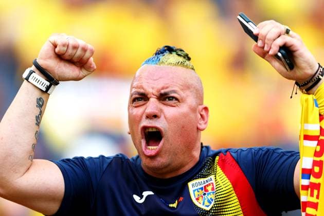 A Romanian fan chants ahead of the game Slovakia v Romania, UEFA European Championship, EM, Europameisterschaft 2024, Group E, Football, Frankfurt Arena, Frankfurt am Main, Germany - 26 Jun 2024 EDITORIAL USE ONLY No use with unauthorised audio, video, data, fixture lists, club league logos or live services. Online in-match use limited to 120 images, no video emulation. No use in betting, games or single club league player publications.  Copyright: xKieranxMcManus Shutterstockx 14555603d
