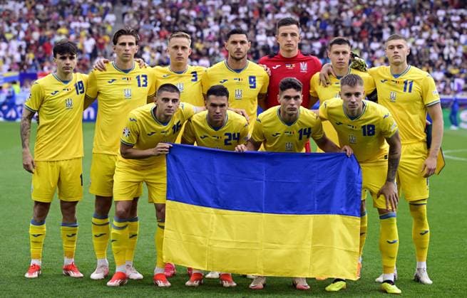 Ukraine s Illya Zabarnyi, Ukraine s Oleksandr Svatok, Ukraine s Roman Yaremchuk, Ukraine s goalkeeper Anatoliy Trubin, Ukraine s Artem Dovbyk, Ukraine s Viktor Tsyhankov, Ukraine s Oleksandr Tymchyk, Ukraine s Heorhiy Sudakov and Ukraine s Volodymyr Brazhko pose for the photographer during a soccer game between Ukraine and Belgian national soccer team Red Devils, Wednesday 26 June 2024 in Stuttgart, Germany, the third match in the group stage of the UEFA EURO, EM, Europameisterschaft,Fussball 2024 European championships. DIRKxWAEM x95322608x