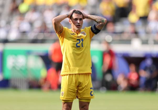 26.06.2024, Fussball Europameisterschaft, UEFA EURO, EM, Europameisterschaft,Fussball 2024, Slowakei - Rumänien, Gruppe E, Arena Frankfurt, v.l., Nicolae Claudiu Stanciu (Rumänien) enttaeuscht, enttaeuscht schauend, dissapointed, traurig, frustiert, frust, gefrustet Copyright: HMBxMedia