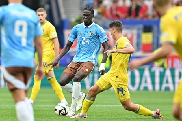 240626 EURO2024 UKRAINE VS BELGIUM Amadou Onana (24) of Belgium pictured in a duel with Georgiy Sudakov (14) of Ukraine during a soccer game between the national teams of Ukraine and Belgium, called the Red Devils on the third matchday in Group E in the group stage of the UEFA EURO, EM, Europameisterschaft,Fussball 2024 tournament , on Wednesday 26 June 2024 in Stuttgart , Germany . PHOTO SPORTPIX David Catry STUTTGART GERMANY  Copyright: xx 469860
