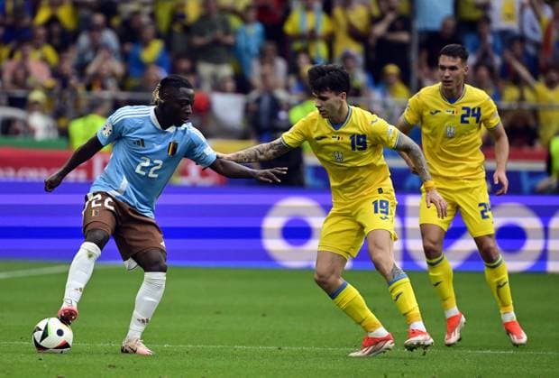 Belgium s Jeremy Doku, Ukraine s Oleksandr Tymchyk and Ukraine s Mykola Shaparenko pictured during a soccer game between Ukraine and Belgian national soccer team Red Devils, Wednesday 26 June 2024 in Stuttgart, Germany, the third match in the group stage of the UEFA EURO, EM, Europameisterschaft,Fussball 2024 European championships. DIRKxWAEM  x95324779x