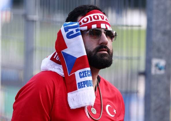 A Turkey fan wearing a scarf around their head Czechia v Turkiye, UEFA European Championship, EM, Europameisterschaft 2024, Group F, Football, Volksparkstadion, Hamburg, Germany - 26 Jun 2024 EDITORIAL USE ONLY No use with unauthorised audio, video, data, fixture lists, club league logos or live services. Online in-match use limited to 120 images, no video emulation. No use in betting, games or single club league player publications. Copyright: xMattxWest Shutterstockx 14555612h