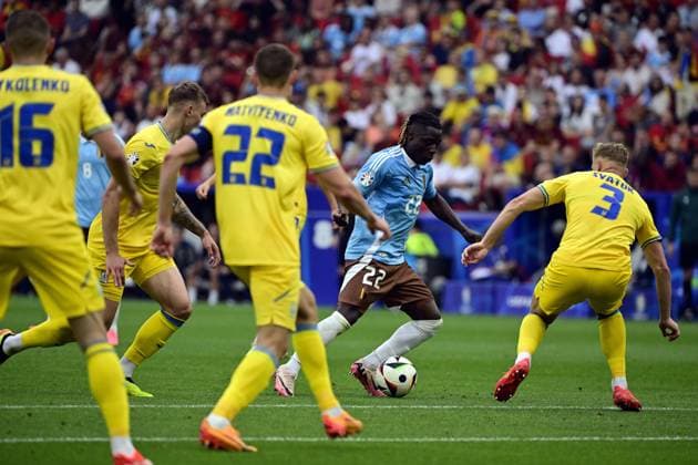 Belgium s Jeremy Doku and Ukraine s Oleksandr Svatok pictured in action during a soccer game between Ukraine and Belgian national soccer team Red Devils, Wednesday 26 June 2024 in Stuttgart, Germany, the third match in the group stage of the UEFA EURO, EM, Europameisterschaft,Fussball 2024 European championships. DIRKxWAEM  x95327827x