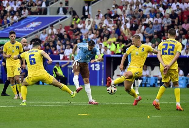 Belgium s Yannick Carrasco and Ukraine s Oleksandr Svatok pictured in action during a soccer game between Ukraine and Belgian national soccer team Red Devils, Wednesday 26 June 2024 in Stuttgart, Germany, the third match in the group stage of the UEFA EURO, EM, Europameisterschaft,Fussball 2024 European championships. DIRKxWAEM  x95329560x