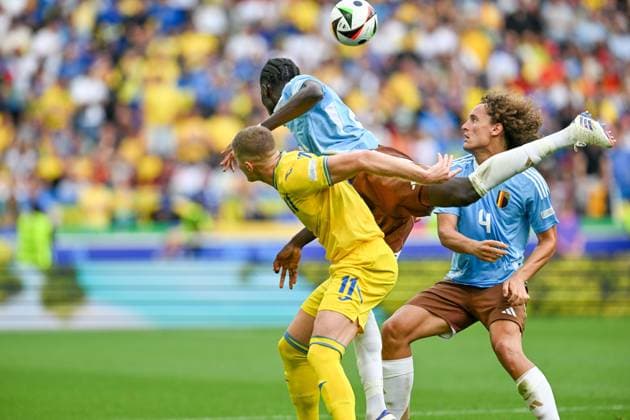 240626 EURO2024 UKRAINE VS BELGIUM Artem Dovbyk (11) of Ukraine, Amadou Onana (24) of Belgium and Wout Faes (4) of Belgium fighting for the ball during a soccer game between the national teams of Ukraine and Belgium, called the Red Devils on the third matchday in Group E in the group stage of the UEFA EURO, EM, Europameisterschaft,Fussball 2024 tournament , on Wednesday 26 June 2024 in Stuttgart , Germany . PHOTO SPORTPIX David Catry STUTTGART GERMANY  Copyright: xx 469944