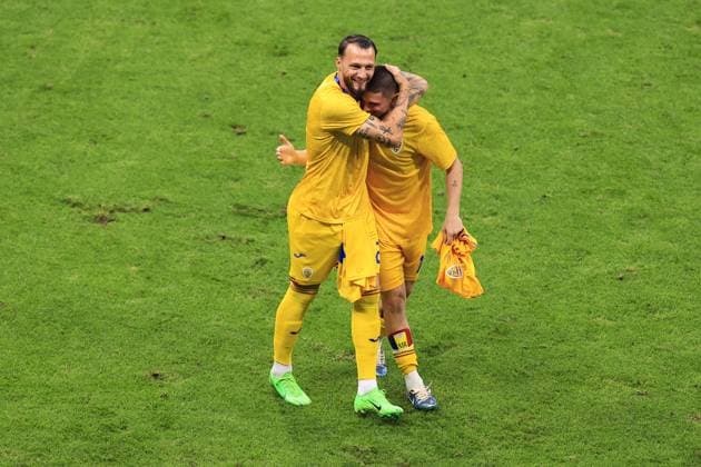 Football - UEFA EURO, EM, Europameisterschaft,Fussball 2024 - Group E - Slovakia v Romania 26th June 2024 - UEFA EURO 2024 - Group E - Slovakia v Romania - Vasile Mogos of Romania (left) and Razvan Marin of Romania celebrate progressing to the next round - Photo: Simon Stacpoole Offside. Frankfurt Germany Copyright: xSimonxStacpoolexOffside