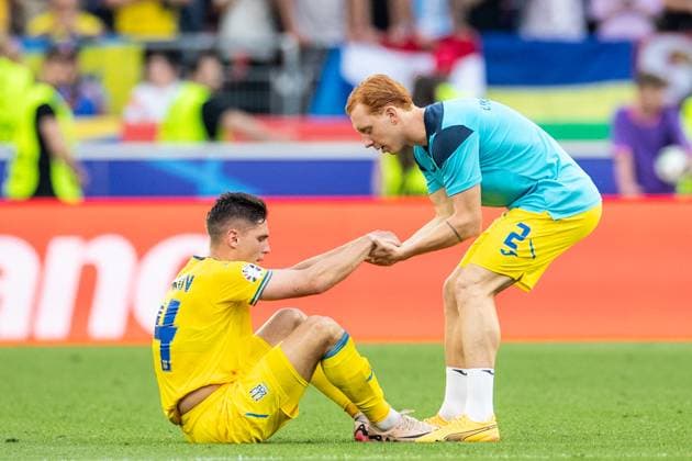 UEFA EURO, EM, Europameisterschaft,Fussball 2024: Ukraine - Belgien; 26.06.2024 Georgiy Sudakov (Ukraine, 14), Yukhym Konoplia (Ukraine, 2) nach dem Spielende, traurig. UEFA EURO 2024: Ukraine - Belgien; Stuttgart Stadion, Stuttgart; 26.06.2024 Copyright: xBEAUTIFULxSPORTS Buriakovx