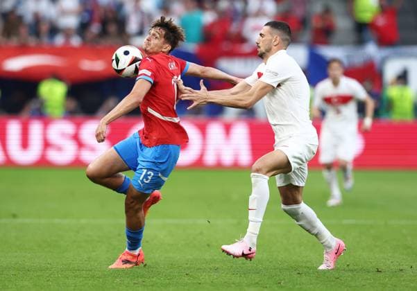 Merih Demiral of Türkiye challenges Mojmir Chytil of Czechia Czechia v Turkiye, UEFA European Championship, EM, Europameisterschaft 2024, Group F, Football, Volksparkstadion, Hamburg, Germany - 26 Jun 2024 EDITORIAL USE ONLY No use with unauthorised audio, video, data, fixture lists, club league logos or live services. Online in-match use limited to 120 images, no video emulation. No use in betting, games or single club league player publications. Copyright: xMattxWest Shutterstockx 14555612ae