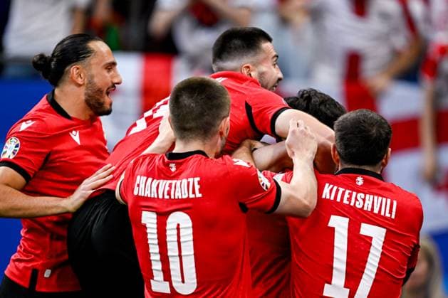2024-06-26 Georgia v Portugal - Group F - UEFA EURO, EM, Europameisterschaft,Fussball 2024 GELSENKIRCHEN, GERMANY - JUNE 26: Khvicha Kvaratskhelia of Georgia celebrates after scoring his teams first goal during the Group F - UEFA EURO 2024 match between Georgia and Portugal at Arena AufSchalke on June 26, 2024 in Gelsenkirchen, Germany. (Photo by Pablo Morano BSR Agency) Gelsenkirchen Germany Content not available for redistribution in The Netherlands directly or indirectly through any third parties. Copyright: xBSRxAgencyx