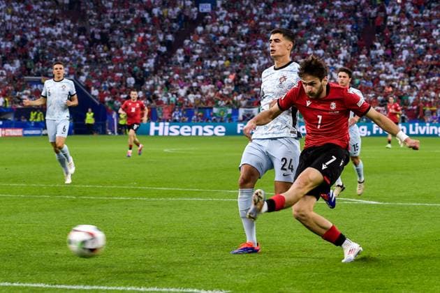 2024-06-26 Georgia v Portugal - Group F - UEFA EURO, EM, Europameisterschaft,Fussball 2024 GELSENKIRCHEN, GERMANY - JUNE 26: Khvicha Kvaratskhelia of Georgia scoring a goal during the Group F - UEFA EURO 2024 match between Georgia and Portugal at Arena AufSchalke on June 26, 2024 in Gelsenkirchen, Germany. (Photo by Pablo Morano BSR Agency) Gelsenkirchen Germany Content not available for redistribution in The Netherlands directly or indirectly through any third parties. Copyright: xBSRxAgencyx