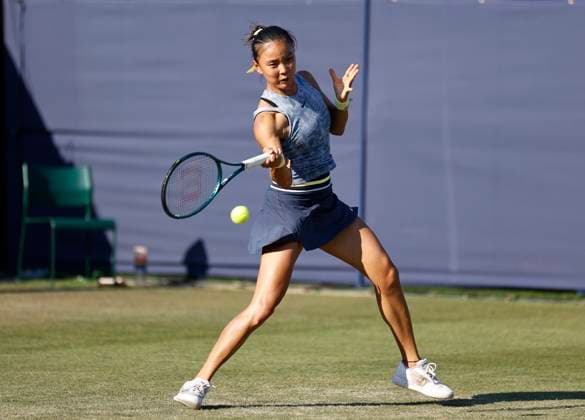 26th June 2024; Devonshire Park, Eastbourne, East Sussex, England: Rothesay International Eastbourne, Day 3, Yue Yua (CHN) plays a backhand against Daria Kasatkina  ActionPlus12660911 HongboxChen