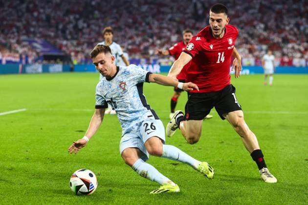 Georgia v Portugal 26 June 2024, Gelsenkirchen - UEFA EUROs - Group F - Georgia v Portugal - Francisco Conceicao of Portugal and Luka Lochoshvili of Georgia - Photo: Charlotte Wilson Offside. Gelsenkirchen Germany Copyright: xCharlottexWilsonx xOffsidexOffside